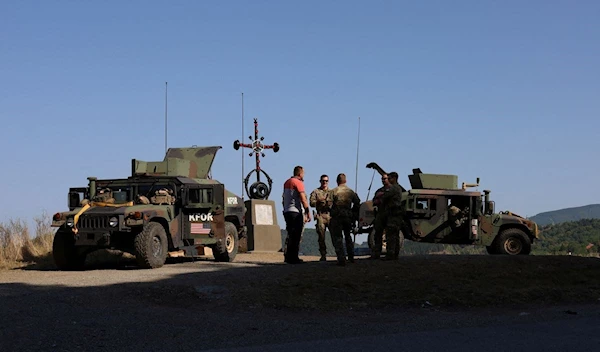 US troops part of a KFOR patrol, near Jarinje border crossing in Kosovo, August 18, 2022 (Reuters).