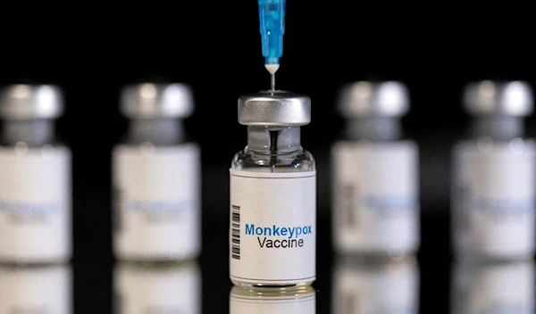 Mock-up vials labeled "Monkeypox vaccine" and medical syringe are seen in this illustration taken, May 25, 2022 (Reuters).