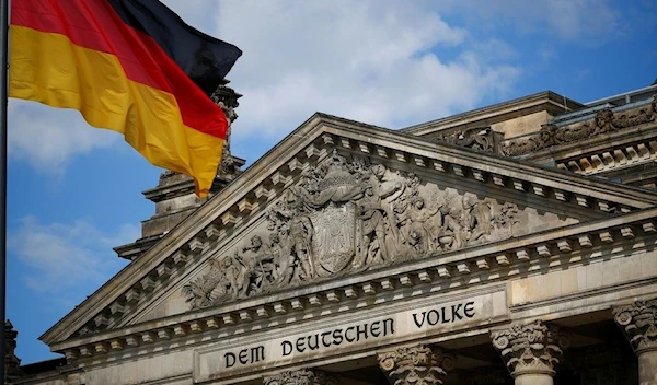 A German flag flutters in front of the Reichstag building in Berlin, Germany, September 6, 2020 (Reuters).