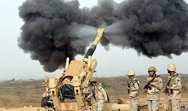 Saudi army artillery fire shells at Yemen from a post close to the Saudi-Yemeni border, in southwestern Saudi Arabia, on April 13, 2015 (AFP)