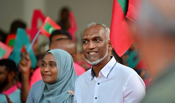 Maldives' main opposition candidate Mohamed Muiz participates in a rally as he concludes his campaign for the second round of presidential election in capital Male, Maldives, Friday, Sept.29, 2023.