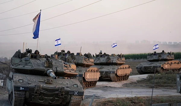 Israeli tanks head towards the Gaza Strip border in southern occupied on Thursday, Oct.12, 2023 (AP Photo)