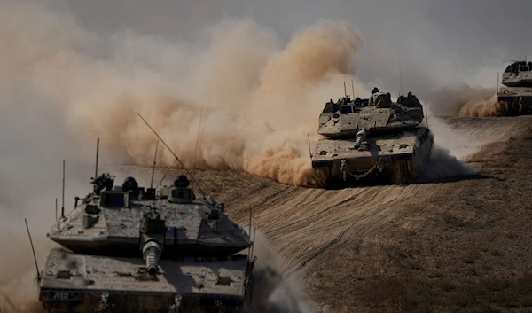 Israeli tanks head toward the Gaza Strip border in southern Israel on October 13, 2023. (AP)