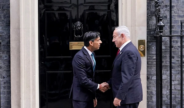 Britain's Prime Minister Rishi Sunak, left, welcomes Prime Minister Benjamin Netanyahu at 10 Downing Street in London, March 24, 2023. (AP)