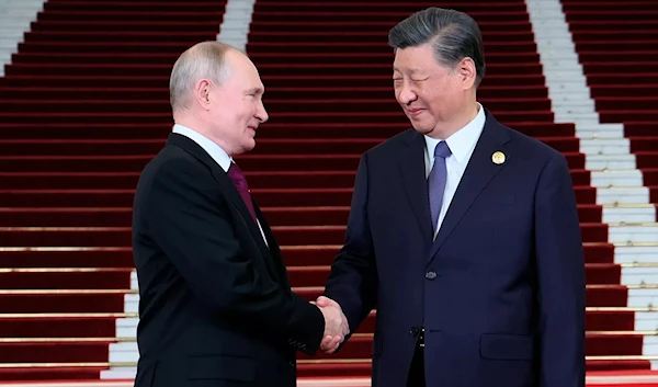 Russian President Vladimir Putin meets Chinese President Xi Jinping in Beijing. (Sputnik, Kremlin Pool Photo via AP)