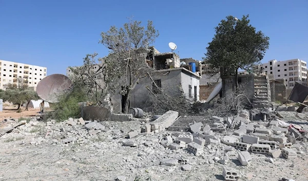 A building destroyed in the shelling is seen in Idlib, Syria, Friday, Oct. 6, 2023. (AP Photo/Ghaith Alsayed)