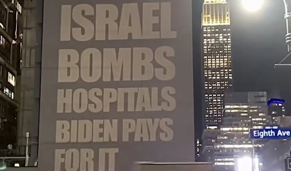 Billboard reading Israel Bombs Hospitals and Biden Pays for it as seen in New York, US, on October 17, 2023. (AP)