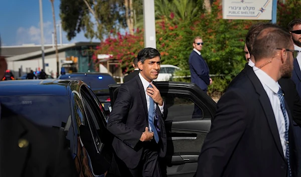 British Prime Minister Rishi Sunak arrives at Ben Gurion airport, near Tel Aviv, occupied Palestine, Thursday, Oct. 19, 2023. (AP Photo/Ohad Zwigenberg)