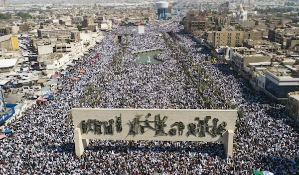 Iraqis hold a mass rally condemning the Israeli ongoing genocide on Friday, Oct. 13, 2023, in Baghdad, Iraq. (AP)