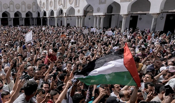 Protesters shout Pro-Palestine slogans during a rally to show solidarity with the people of Gaza after Friday prayers at Azhar mosque, in Cairo, Egypt, Friday, Oct. 20, 2023 (AP Photo/Amr Nabil)