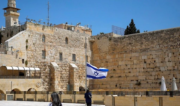 Israeli flag lowered to half mast, Occupied Al-Quds, May 2, 2021 (AP)