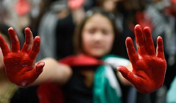 A rally in Chile in support of Palestine (AFP)