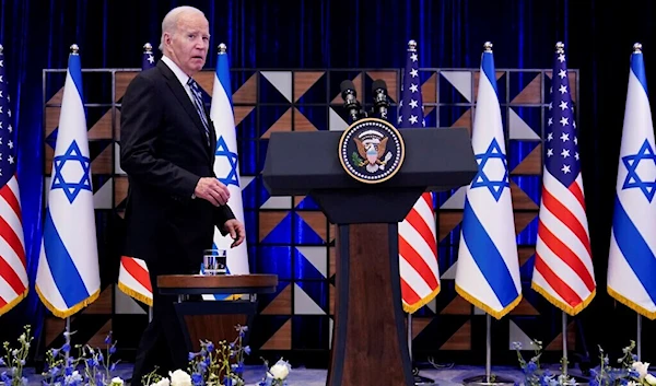 US President Joe Biden walks to the podium to deliver remarks on the war between Israel and Hamas, October 18, 2023, in "Tel Aviv" (AP)