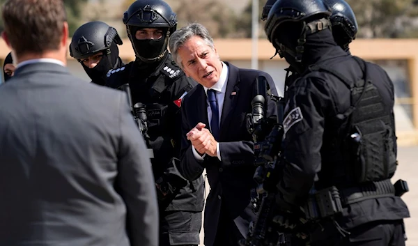 US Secretary of State Antony Blinken with members of Jordan special forces upon his departure from the airport, in Amman, Jordan, Friday Oct. 13, 2023. (AP)