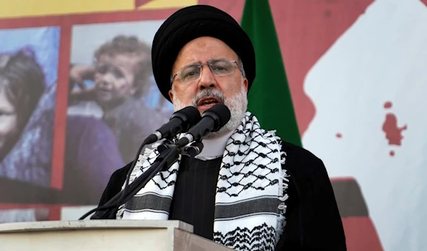 Iranian President Ebrahim Raisi speaks during an anti-Israel rally at Enqelab-e-Eslami (Islamic Revolution) Sq. in Tehran, Iran, Wednesday, Oct. 18, 2023. (AP)