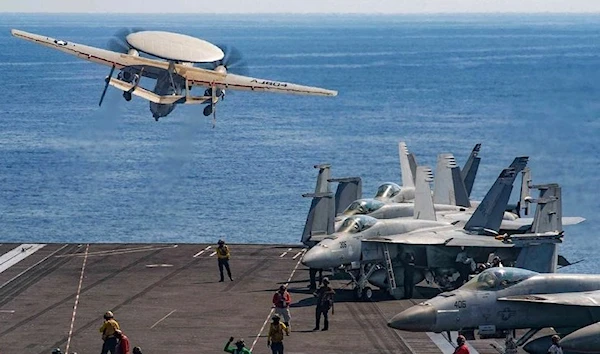 An E-2D Hawkeye launches from the flight deck of the aircraft carrier USS Gerald R. Ford in the eastern Mediterranean Sea on Oct. 12, 2023. (U.S. Navy)