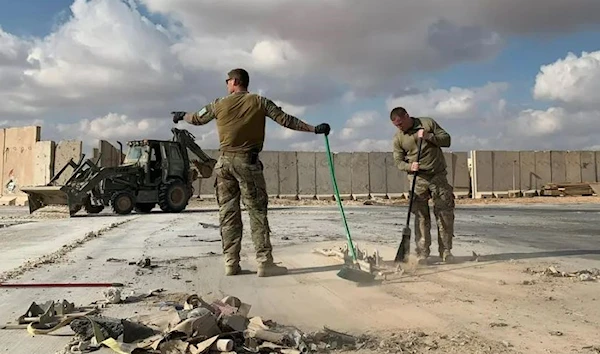 US occupation soldiers clearing rubble at Ain al-Asad military airbase in the western Iraqi province of Anbar on January 13, 2020. (AFP)