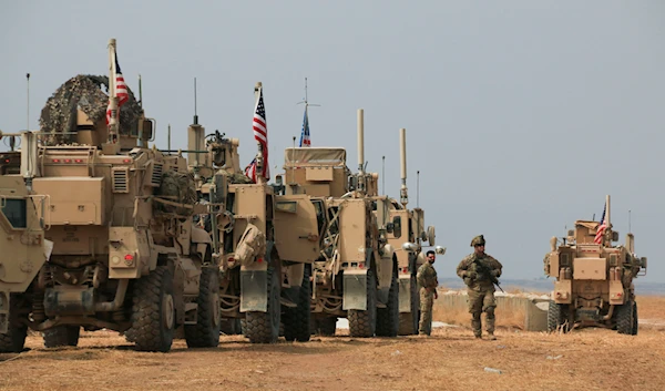 American military convoy stops near the town of Tel Tamr, north Syria, Sunday, Oct. 20, 2019. (AP)