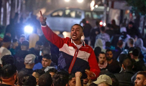 Palestinians rally in the West Bank city of Ramallah this month in solidarity with the Palestinians of the Gaza Strip. (AFP)