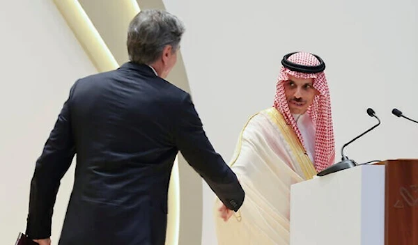 US Secretary of State Antony Blinken, left, shakes hands with Saudi Arabia's Foreign Minister Prince Faisal bin Farhan during a joint news conference in Riyadh, Saudi Arabia, June 8, 2023 (AP/Pool)