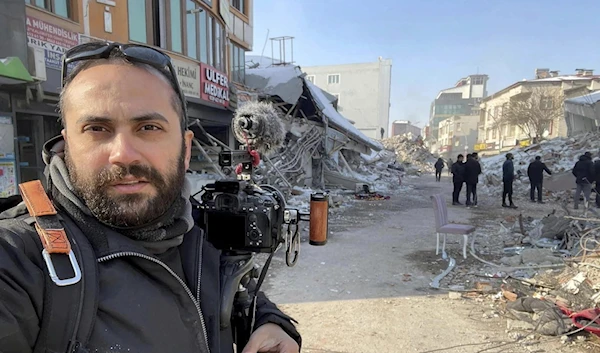 In this photo provided by Reuters, Issam Abdallah, a videographer for the news agency, poses for a selfie while working in Maras, Turkey, in February 11, 2023. (Issam Abdallah/Reuters via AP)