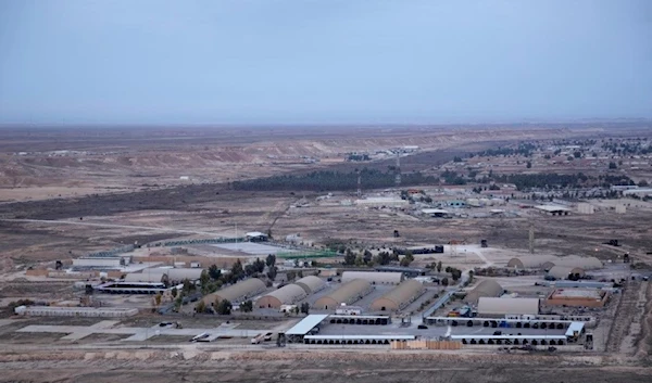 An aerial picture taken from a helicopter shows the US-run Ain al-Asad air base in the western Anbar desert, Iraq. (Photo by AP)