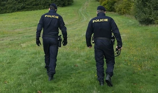 Czech policemen walk on patrol at the border with Slovakia near Stary Hrozenkov, Czech Republic, on Sept. 29, 2022. (AP)