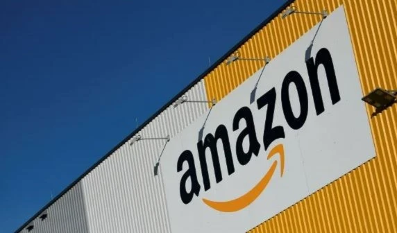 A picture taken on Nov. 8, 2018 shows the Amazon logo displayed outside the group’s distribution center in Dortmund, Germany. (AFP via Getty Images)