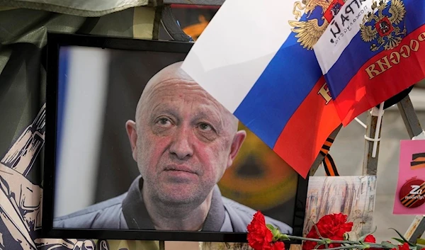 A portrait of the owner of mercenary chief Yevgeny Prigozhin decorates an informal street memorial near the Kremlin in Moscow, Russia, on Saturday, Aug. 26, 2023. (AP)