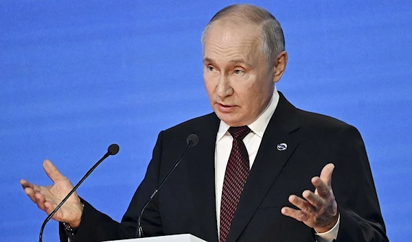 Russian President Vladimir Putin gestures while speaking at the annual meeting of the Valdai Discussion Club in the Black Sea resort of Sochi, Russia on Oct. 5, 2023 (AP/Pool)