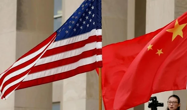 The flags of US and China are seen in this undated file photo (AFP)