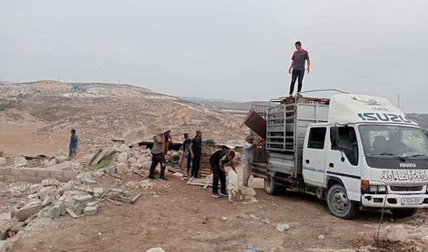 A pickup truck retrieving additional possessions for Palestinians forcibly displaced from Khirbet Zanuta. (Twitter)