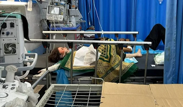 Injured Palestinian Children receive treatment at Al-Shifa hospital in Gaza City on 10 November 2023 after being targeted by an Israeli bombardment (AFP)