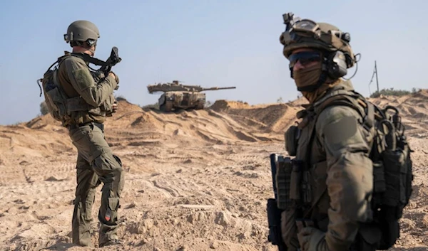 IOF troops stationed near the Gaza Strip on November 2, 2023. (AP)