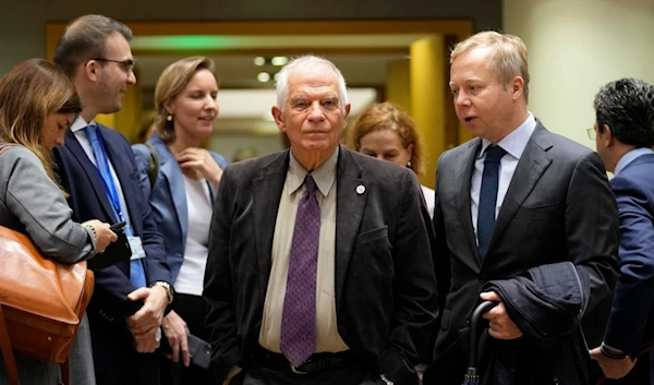 EU foreign policy chief Josep Borrell, center, arrives for a meeting of EU foreign ministers at the European Council building in Brussels, Monday, Nov. 13, 2023. (AP Photo/Virginia Mayo)