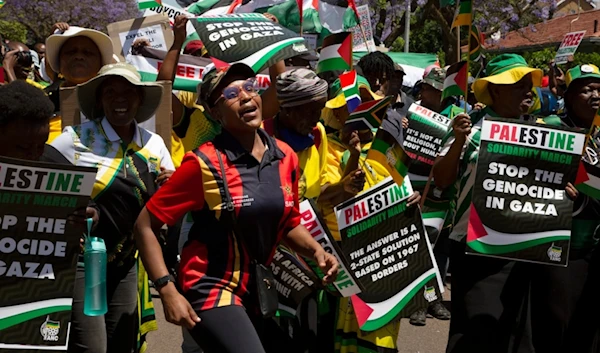 Pro-Palestinian supporters demonstrate at the entrance to the Israeli embassy in Pretoria, South Africa, on Oct. 20, 2023. (AP)