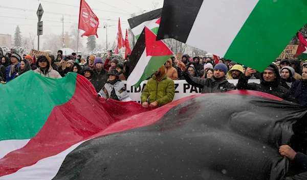 Palestinians and Poles take part in a pro-Palestinian rally in Warsaw, Poland, Saturday Nov. 18, 2023. (AP Photo/Czarek Sokolowski)