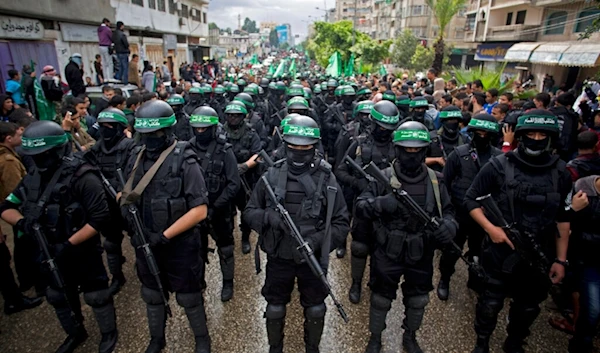 Hamas resistance fighters during a rally commemorating the 27th anniversary of the group in Gaza City,  Dec. 14, 2014 (AP)