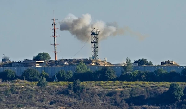 Smoke rises from inside an Israeli army position which was hit by Hezbollah fighters as seen from Tair Harfa village, a Lebanese border village with Israel, south Lebanon, Friday, Oct. 20, 2023. (AP)