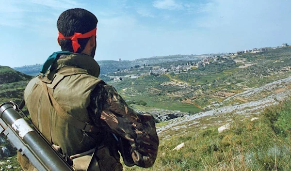 A Lebanese resistance fighter on guard duty, South Lebanon, April1996 (social media)