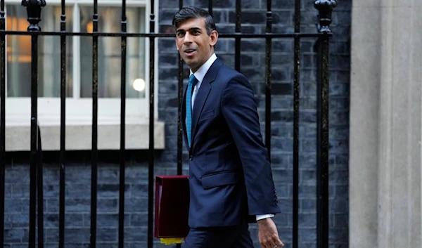 British Prime Minister Rishi Sunak leaves 10 Downing Street to attend the weekly session of Prime Ministers Questions in Parliament in London, November 15, 2023 (AP)