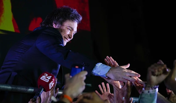 Presidential candidate of the Liberty Advances coalition Javier Milei greets supporters after winning the presidential runoff election in Buenos Aires, Argentina, on Nov. 19, 2023. (AP)