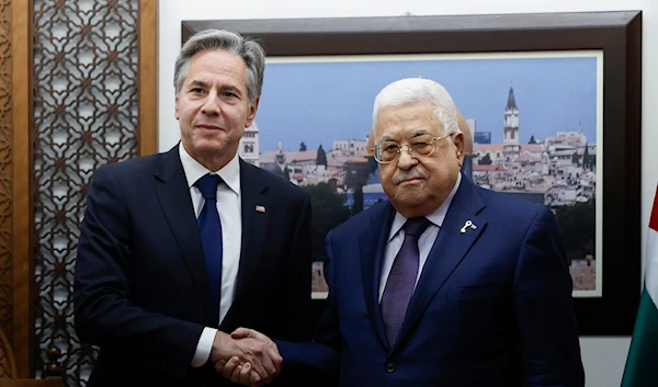 U.S. Secretary of State Antony Blinken meets with Palestinian President Mahmoud Abbas at the Muqata in Ramallah in the Israeli-occupied West Bank, Sunday, Nov. 5, 2023 (AP)