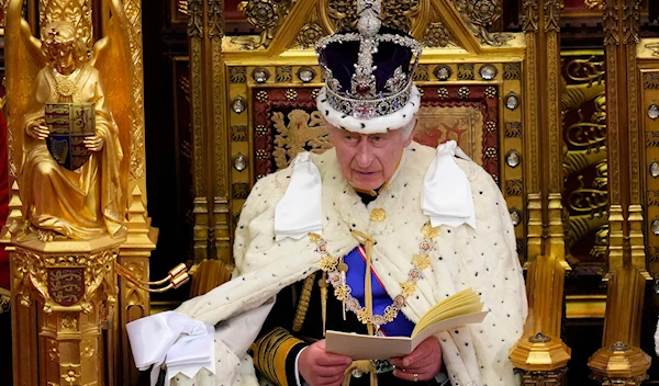 Britain's King Charles III speaks during the State Opening of Parliament at the Palace of Westminster in London, Tuesday, Nov. 7, 2023. (AP)