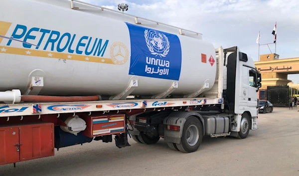 An Egyptian truck delivering fuel to the Gaza Strip waits to cross the Rafah border crossing between the Gaza Strip and Egypt, in Rafah, Egypt, Wednesday, Nov.22, 2023. (AP)