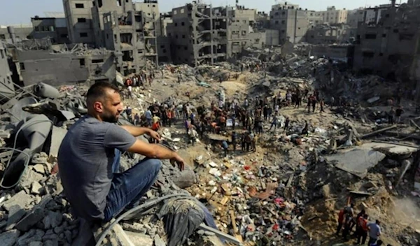 A Gazan surveys the destruction after Israeli airstrikes in the Jabalia refugee camp in northern Gaza on November 1, 2023. (AP)