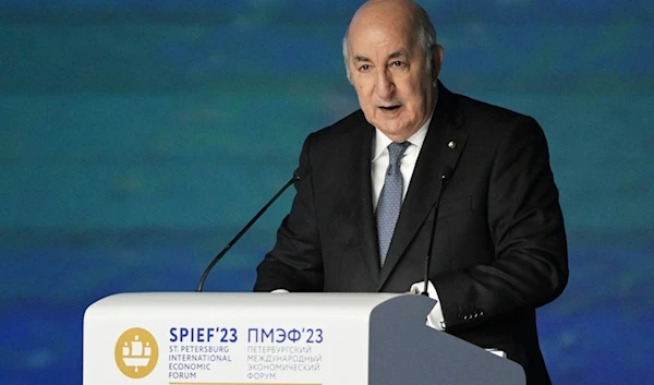 n this handout photo provided by Photo host Agency RIA Novosti, Algerian President Abdelmadjid Tebboune addresses a plenary session of the St. Petersburg International Economic Forum in St. Petersburg, Russia, June 16, 2023 (AP)