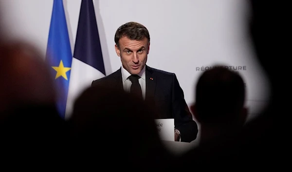 French President Emmanuel Macron delivers his speech after visiting the Marine Museum,  in Paris, Monday, Nov. 27, 2023 (AP)