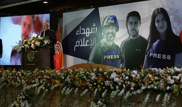 Al Mayadeen media network Chairman of the Board of Directors, Ghassan Ben Jeddou, speaks during a memorial service for Al Mayadeen's martyrs in Beirut, Lebanon, November 28, 2023 (Al Mayadeen)