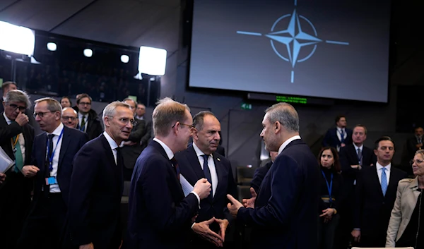 Turkey's Foreign Minister Hakan Fidan, Greece's FM Giorgos Gerapetritis, and Sweden's FM Tobias Billstrom during a meeting at NATO headquarters in Brussels, Nov. 28, 2023. (AP)